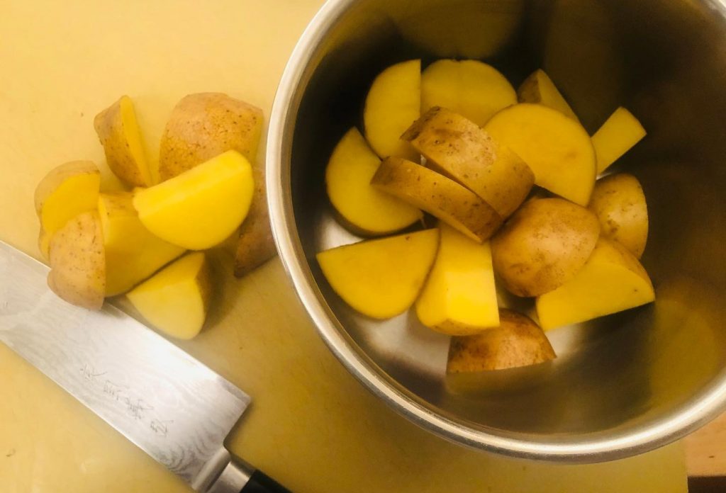 Creamy Mashed Potato: 7 Steps to a Perfectly Smooth, Lump-Free Purée 5 mashed quartered potato