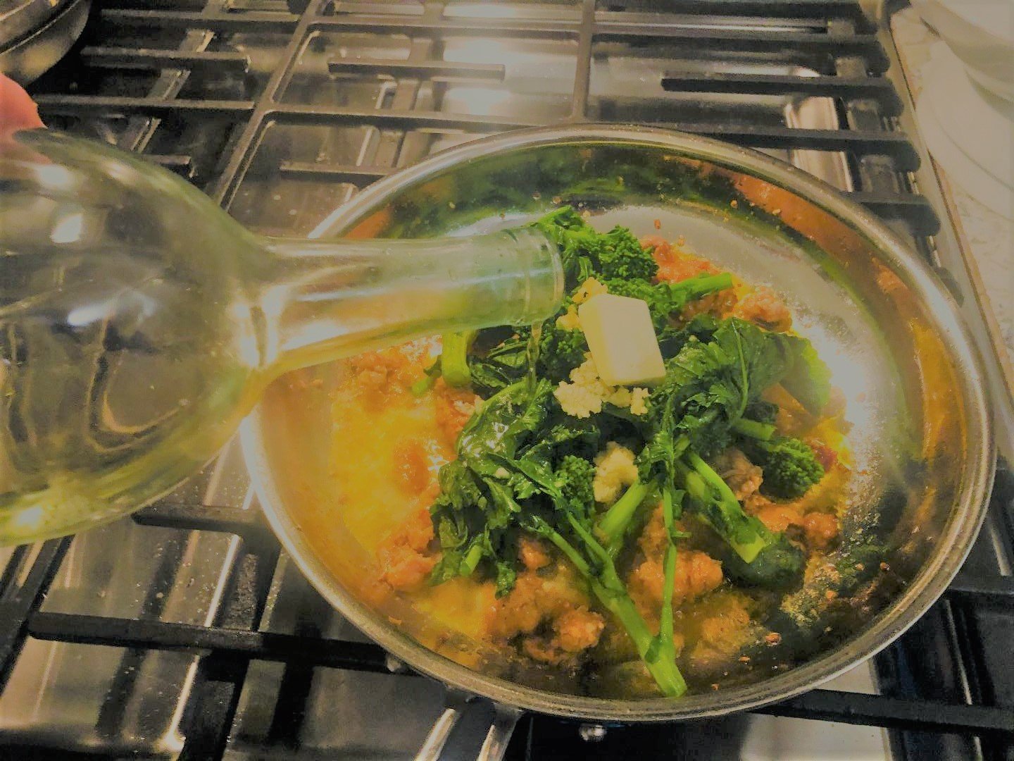 Broccoli Rabe with Spicy Sausage: 5 Tips for Bold Flavor 7 broccoli rabe with spicy sausage served over rigatoni pasta with white wine butter sauce