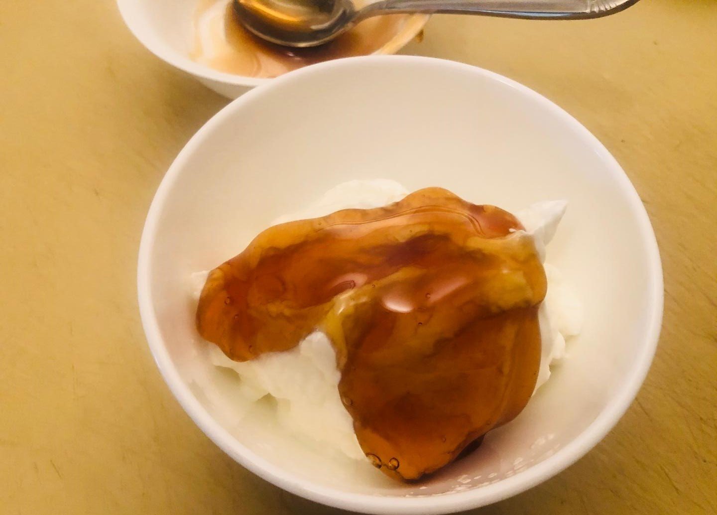 Greek Yogurt Parfait: 5 Layers for a Heavenly Breakfast 5 Thick full-fat Greek yogurt being layered into a Greek yogurt parfait bowl