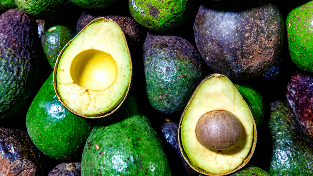 How to cut an avocado.  Choose from the medley of avocados of different colors.