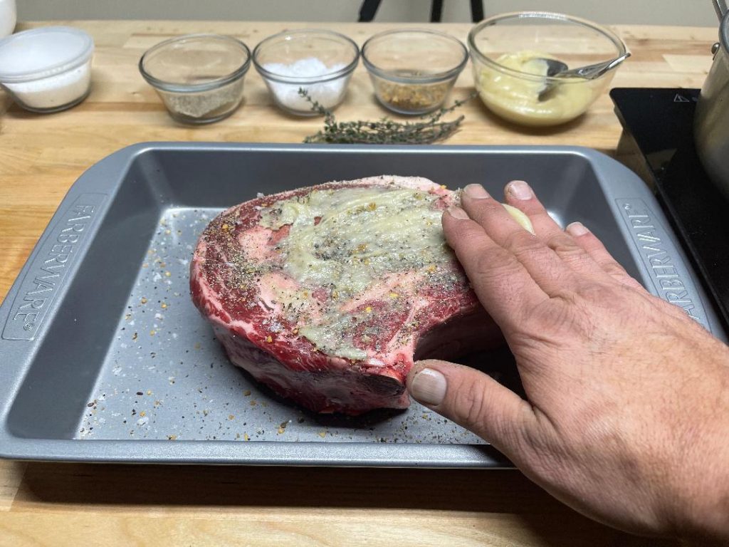 Prime Rib for Two - Perfectly Cooked in 50 Minutes 9 searing prime rib in a hot cast iron skillet