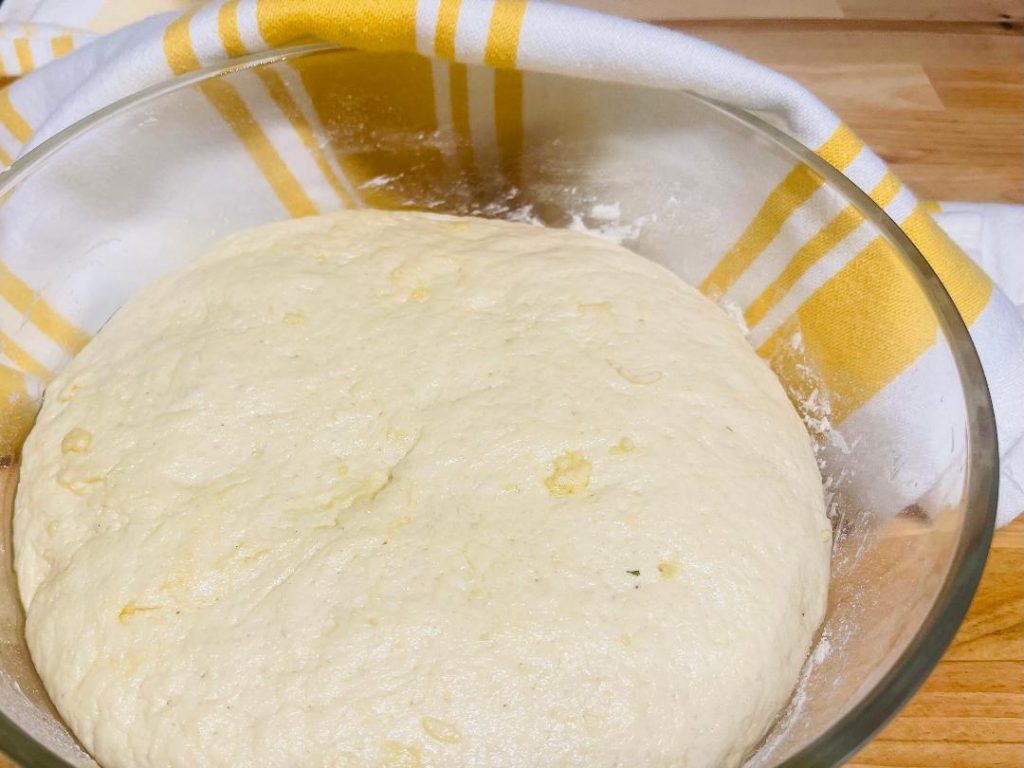 Homemade Pita Bread Recipe: Soft, Fresh & Ready in 90 Minutes 9 dividing pita dough into equal portions