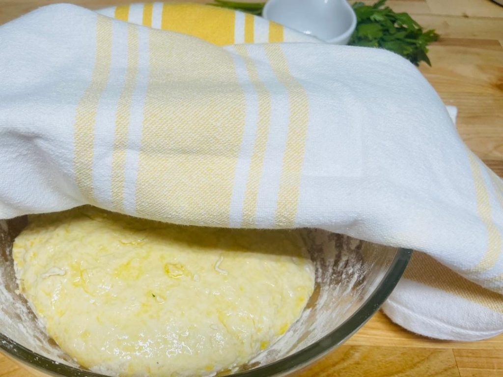 Homemade Pita Bread Recipe: Soft, Fresh & Ready in 90 Minutes 8 kneading pita bread dough on floured surface