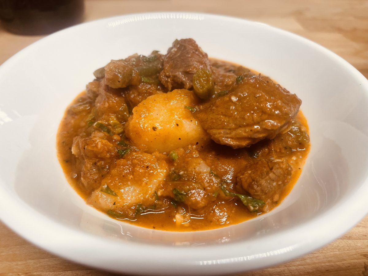 classic greek beef stew kokkinisto in a Dutch oven