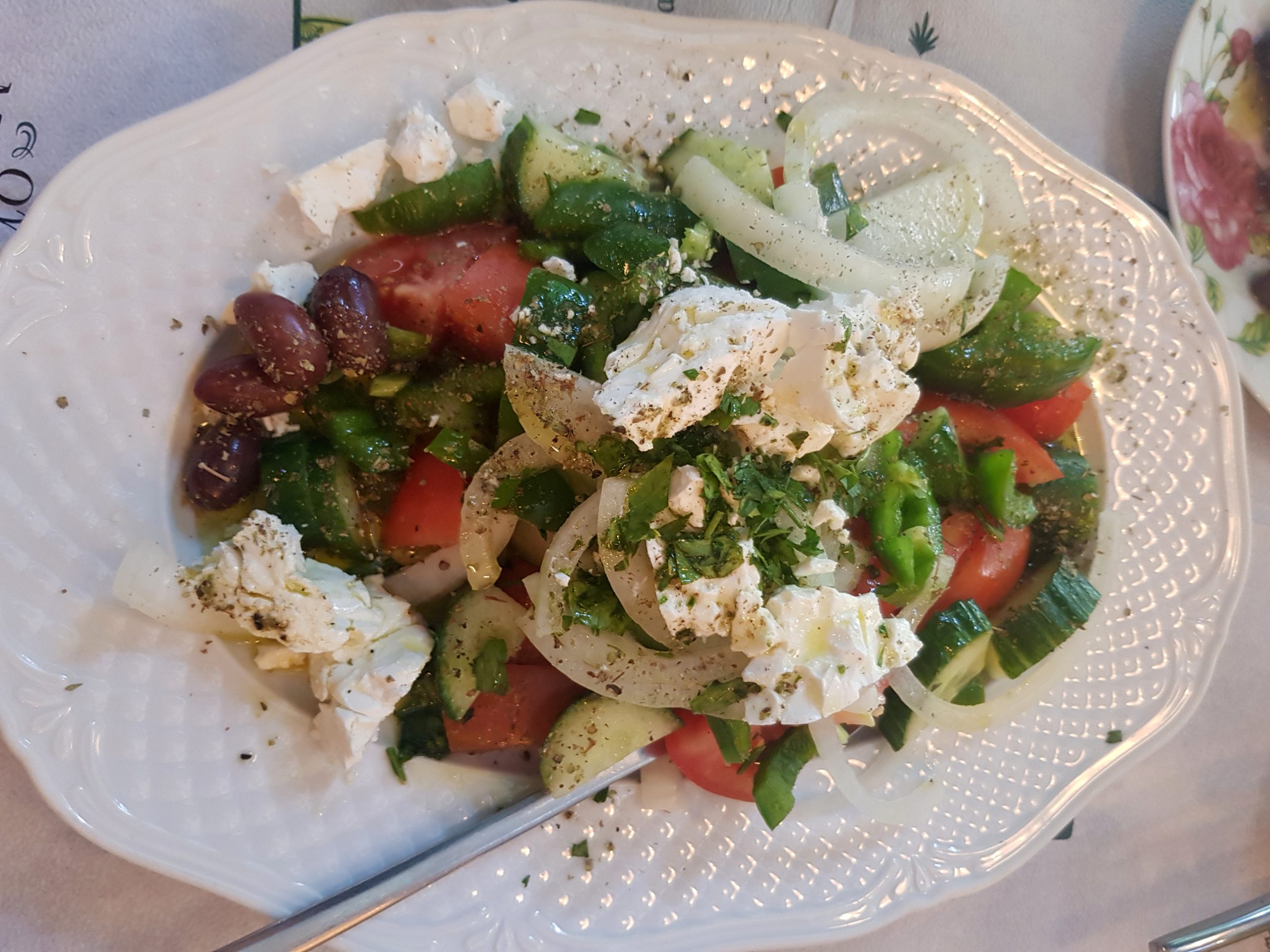 Greek horiatiki salad from Thessaloniki with fresh tomatoes, cucumber, Kalamata olives and feta cheese